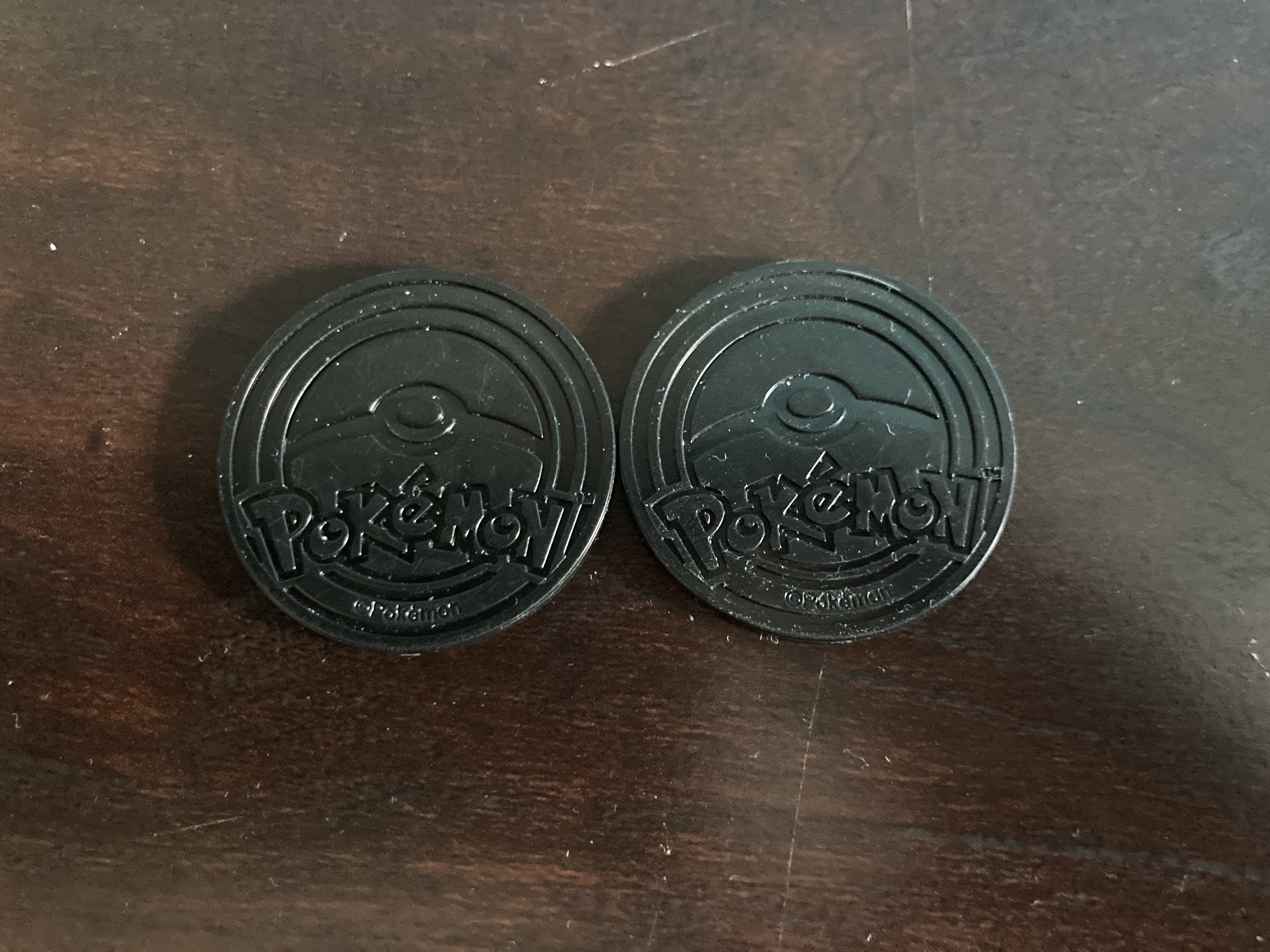 Primarina and Popplio plastic coins